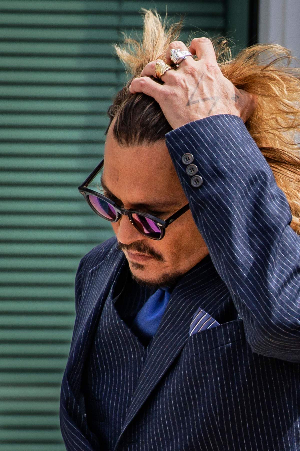 US actor Johnny Depp during a break in the trial at the Fairfax County Circuit Court in Fairfax, Virginia, on April 13, 2022.