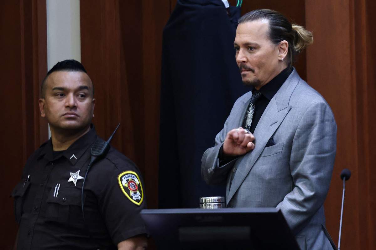 Actor Johnny Depp waits for the jury to leave prior to a break during his defamation trial against his ex-wife Amber Heard at the Fairfax County Circuit Courthouse in Fairfax, Virginia, April 20, 2022.