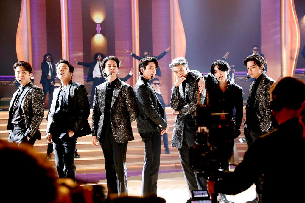 Jimin, J-Hope, Jin, Jungkook, RM, Suga, and V of BTS perform onstage during the 64th Annual GRAMMY Awards at MGM Grand Garden Arena on April 03, 2022 in Las Vegas, Nevada.