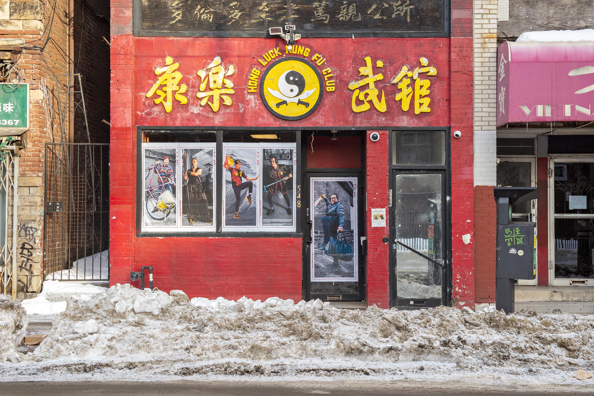The Hong Luck Kung Fu Club in Toronto's Chinatown is adorned with posters from the Long Time No See Collective. Their “Tong Yan Gai, Jeui Ho!” (Chinatown, the best) campaign aims to show that "Toronto’s best Chinatown is not in the past, but in front of us," according to the artists.