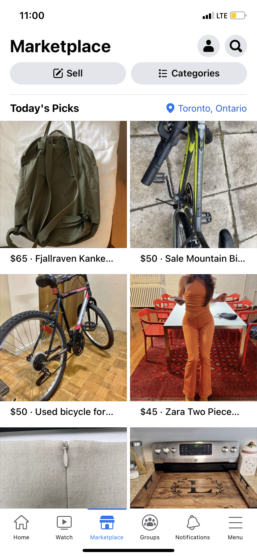 A screenshot of the Facebook Marketplace app showing listings for bikes, a backpack, and clothing.