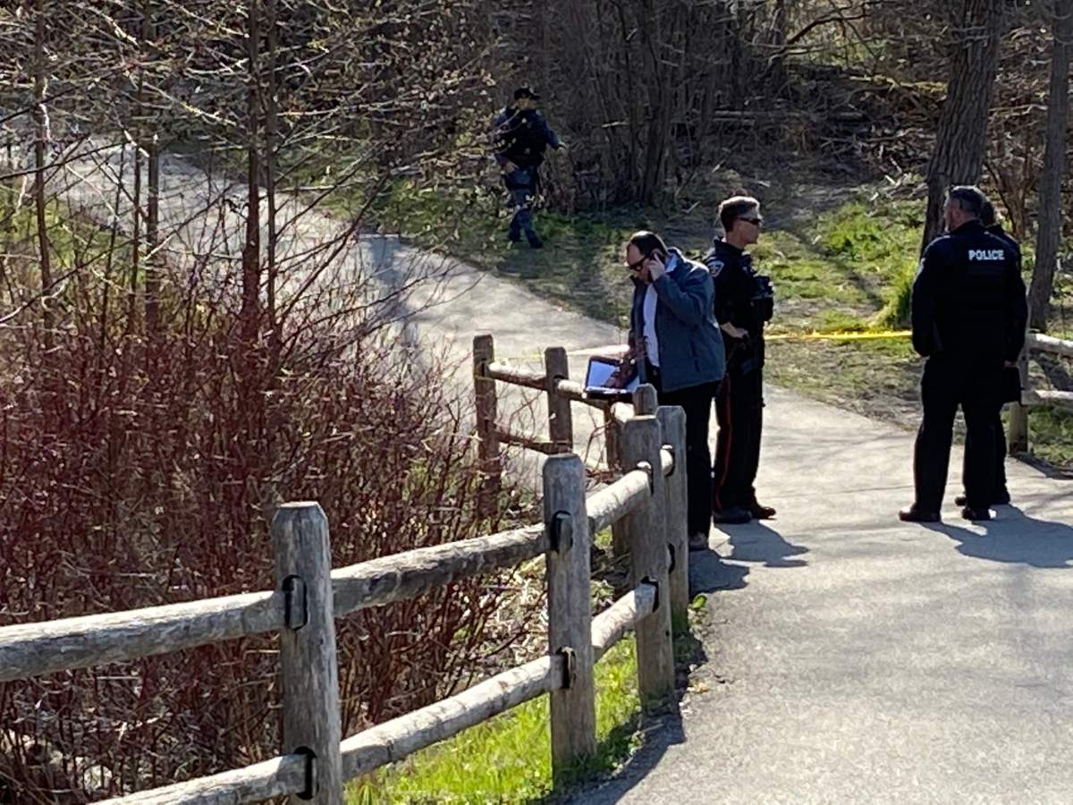 Police told Global News the victim was located along a foot path.
