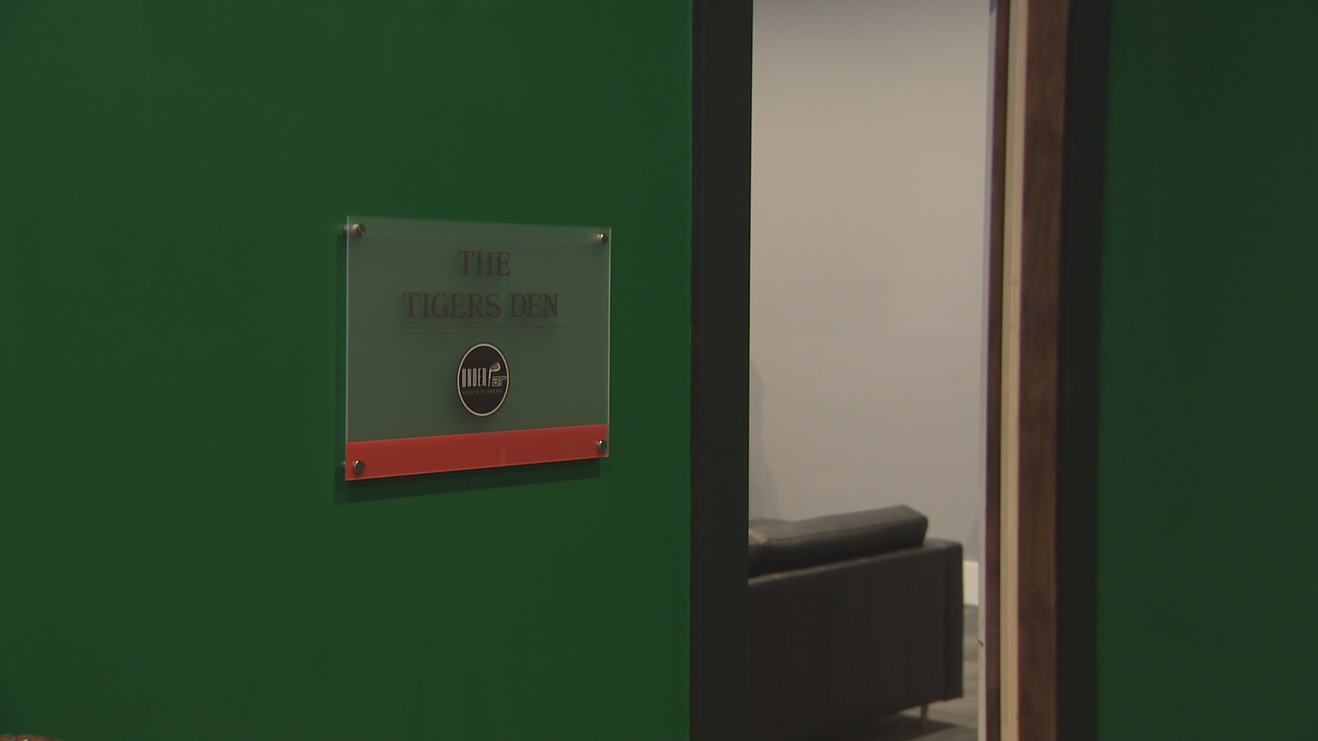 “The Tigers Den” one of three private, themed simulation rooms inside Under Par.