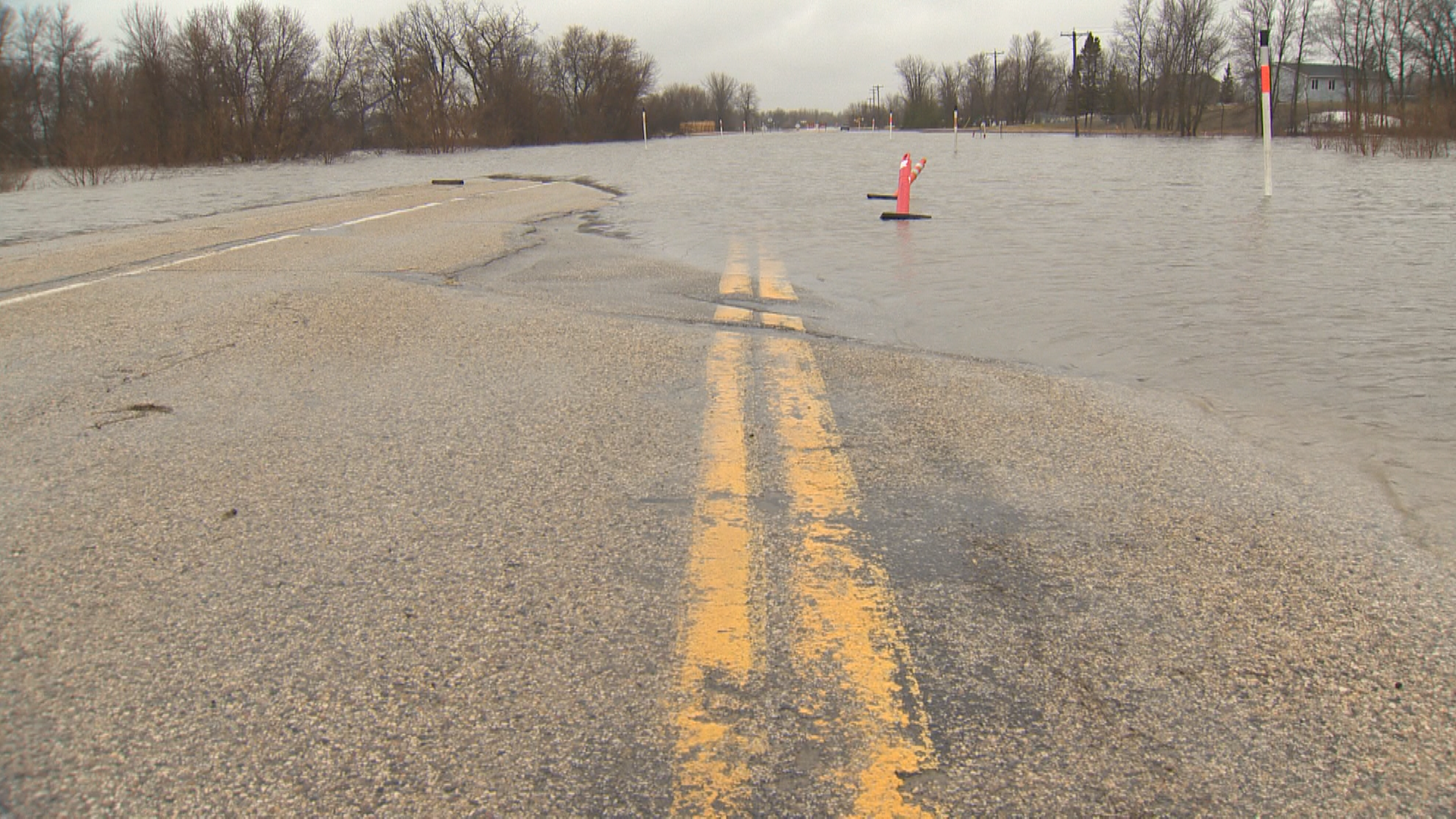 A road partially underwater in the RM of Ritchot, south of Winniepg.