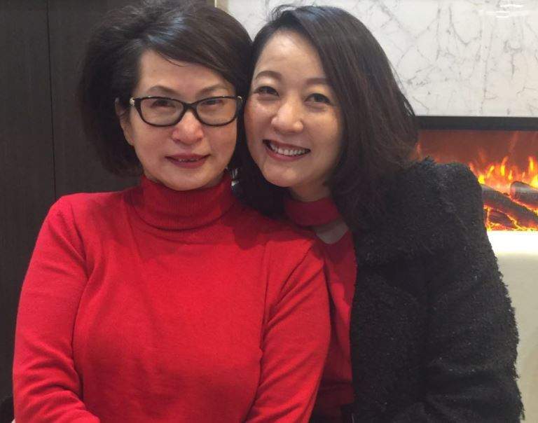 Murder victim Wu Shumin with a friend at Fit Palace.