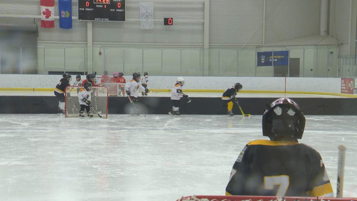 A goalie watches the action at the Alberta Treaty Hockey Games. Apr. 14, 2022.