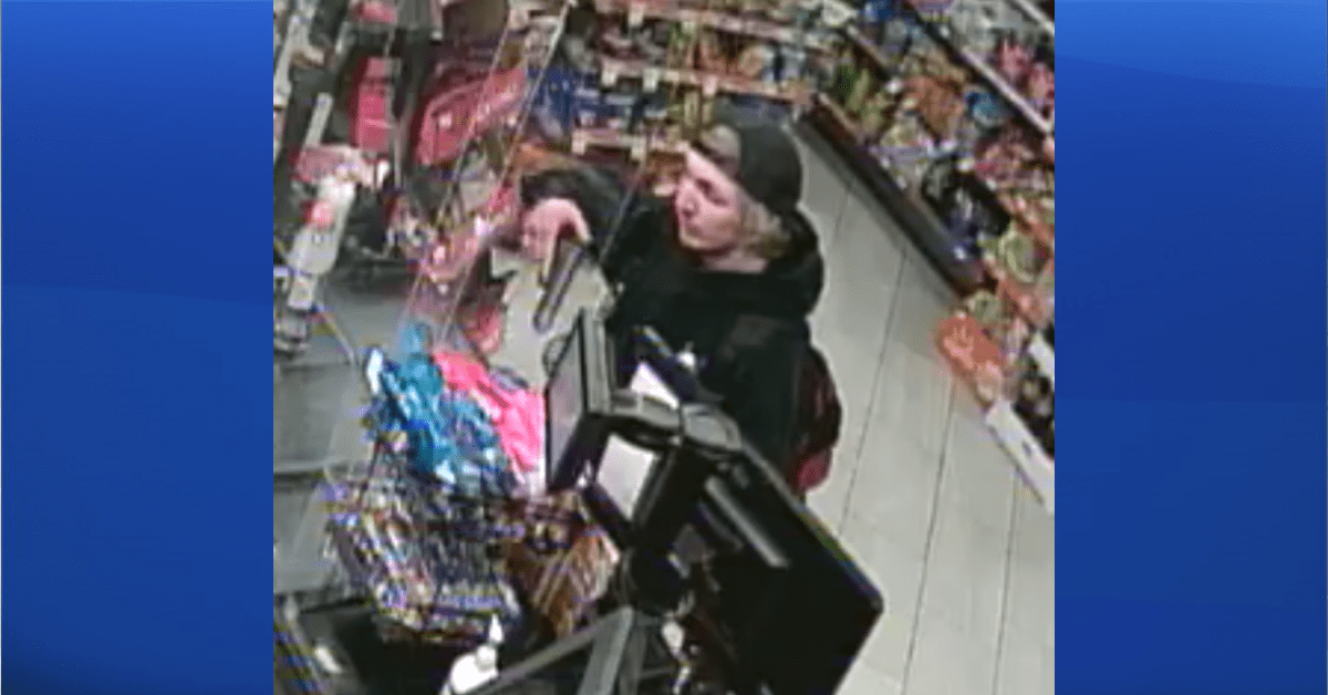 RCMP are looking for a man, seen here on CCTV, who's suspected of armed robbery at the Circle K in High River on April 28, 2022.
