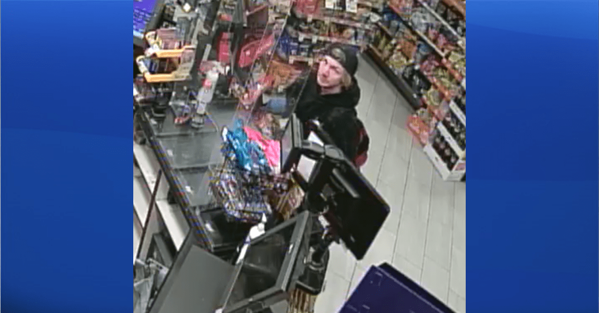 RCMP are looking for a man, seen here on CCTV, who's suspected of armed robbery at the Circle K in High River on April 28, 2022.