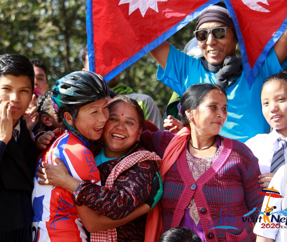 Laxmi Magar (left) celebrating after a race.