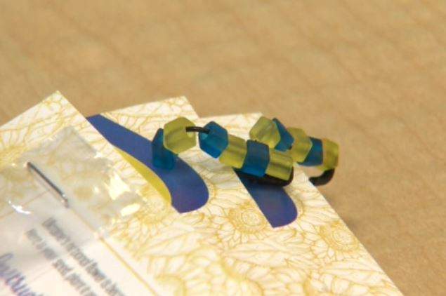 An image of homemade pins in Ukraine's national colours, made by Edmonton Grade 3 students.