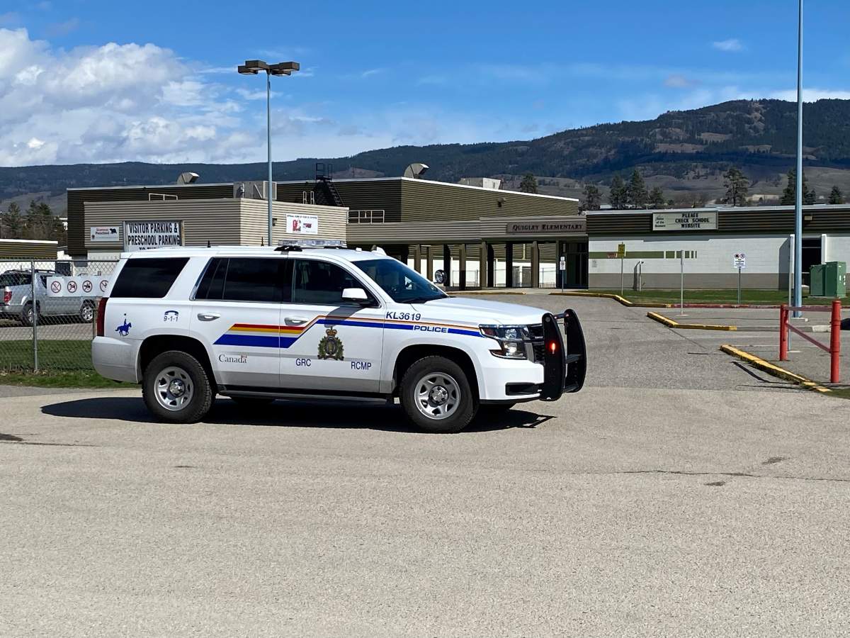A police vehicle in front of Quigley Elementary School. On Monday, the school was evacuated following a bomb threat. The school is back in session.