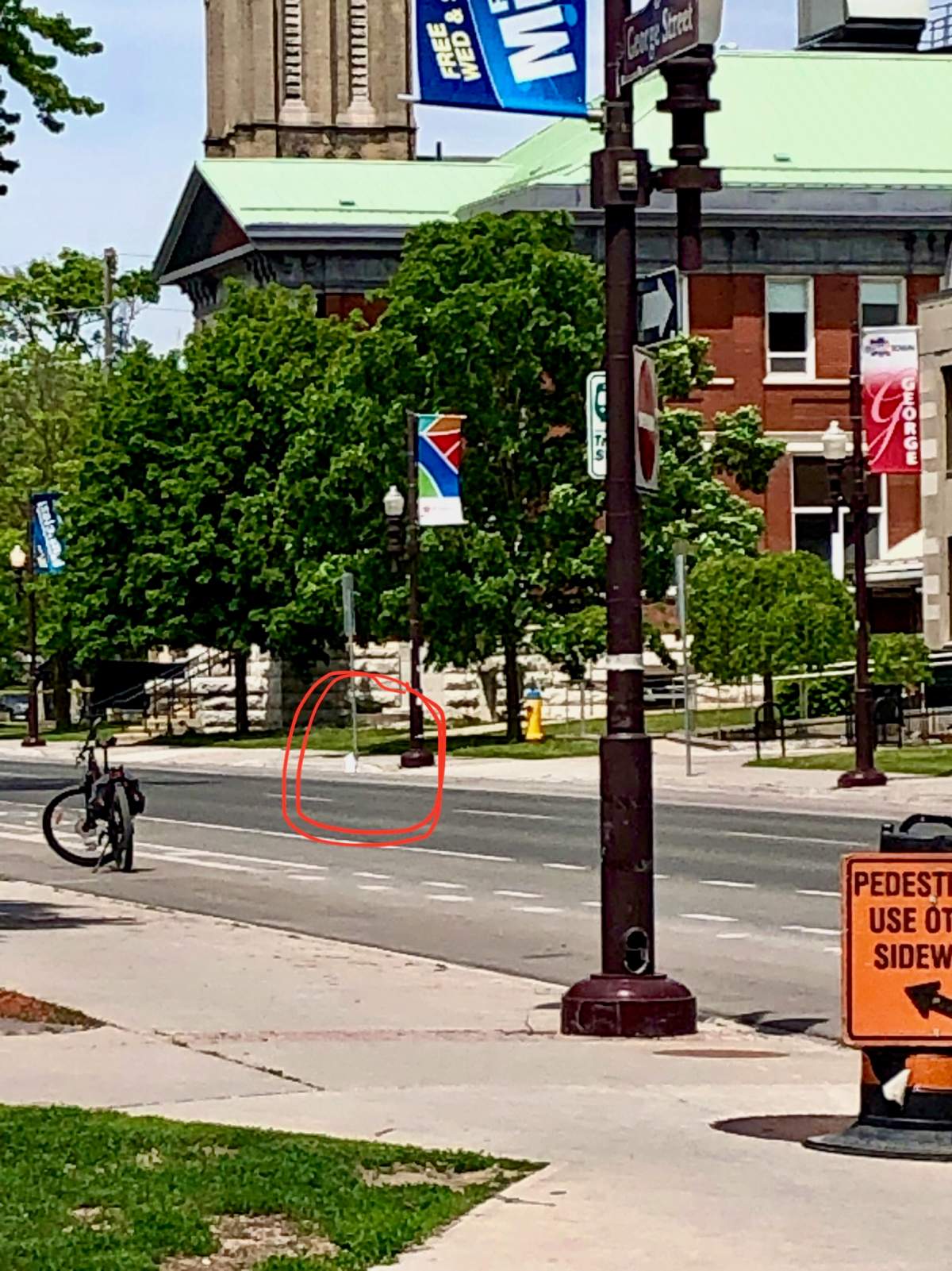 A section of George Street in Peterborough is closed. Police are focusing on an item in front of City Hall.