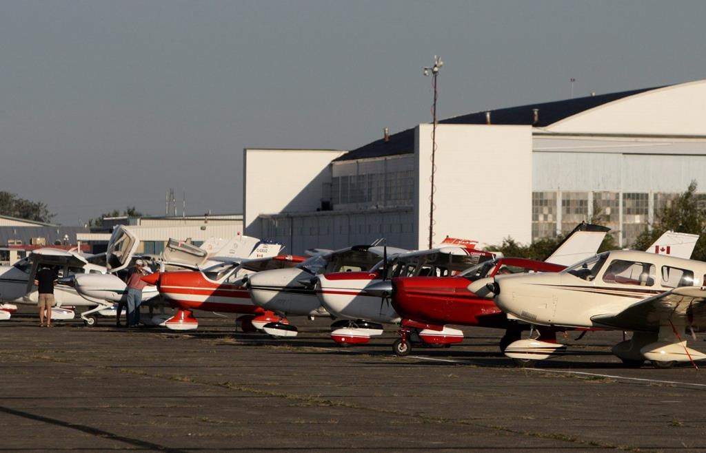 Small planes are parked side-by-side before taking off from Boundary Bay airport in Delta, B.C., on July 17, 2009. THE CANADIAN PRESS/Darryl Dyck.