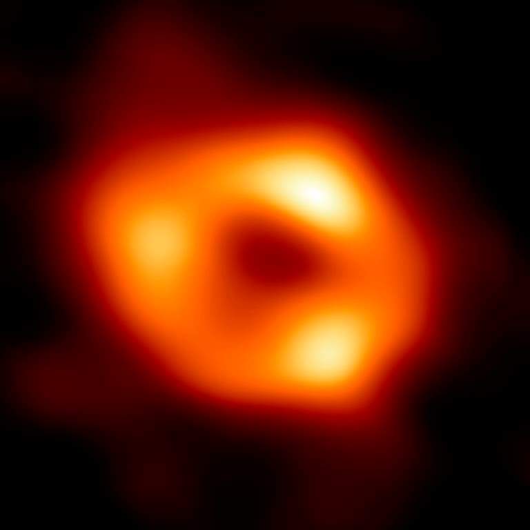 This image released by the Event Horizon Telescope Collaboration, Thursday, May 12, 2022, shows a black hole at the center of our Milky Way galaxy. The Milky Way black hole is called Sagittarius A*, near the border of Sagittarius and Scorpius constellations. It is 4 million times more massive than our sun.