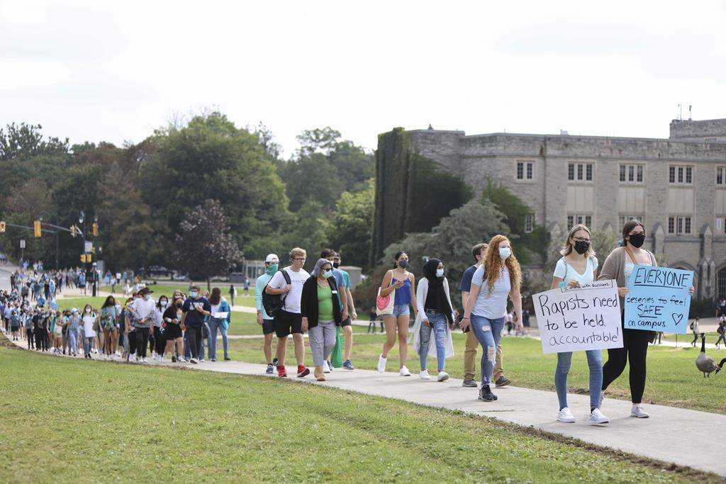 Western University students march during a walkout in support of sexual assault survivors, in London, Ont., Friday, Sept. 17, 2021. Western University says it's introducing new measures and enhancing existing resources to address gender-based and sexual violence in order to provide a safe campus environment for all. THE CANADIAN PRESS/Nicole Osborne.