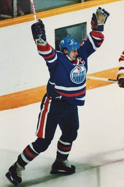 Edmonton Oilers, Wayne Gretzky, celebrates one of his three goals and two assists as the Oilers defeat the Calgary Flames in playoff hockey in Calgary, April 24, 1986.