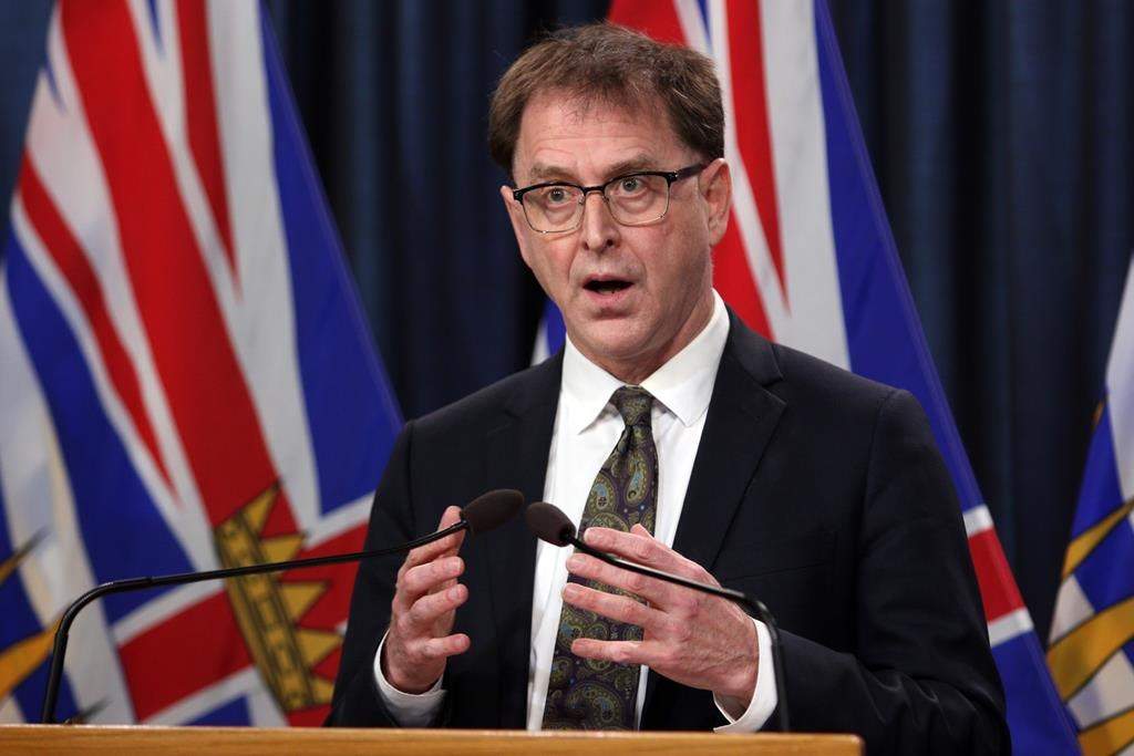 British Columbia Health Minister Adrian Dix speaks at a press conference.
