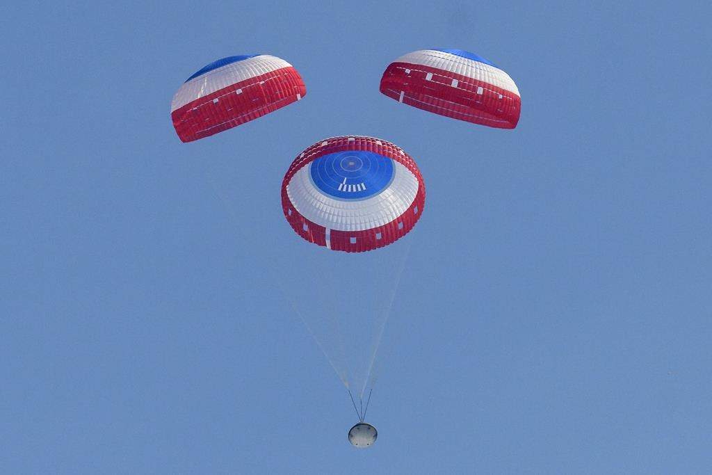 Boeing's CST-100 Starliner spacecraft lands at White Sands Missile Range's Space Harbor, Wednesday, May 25, 2022, in New Mexico.