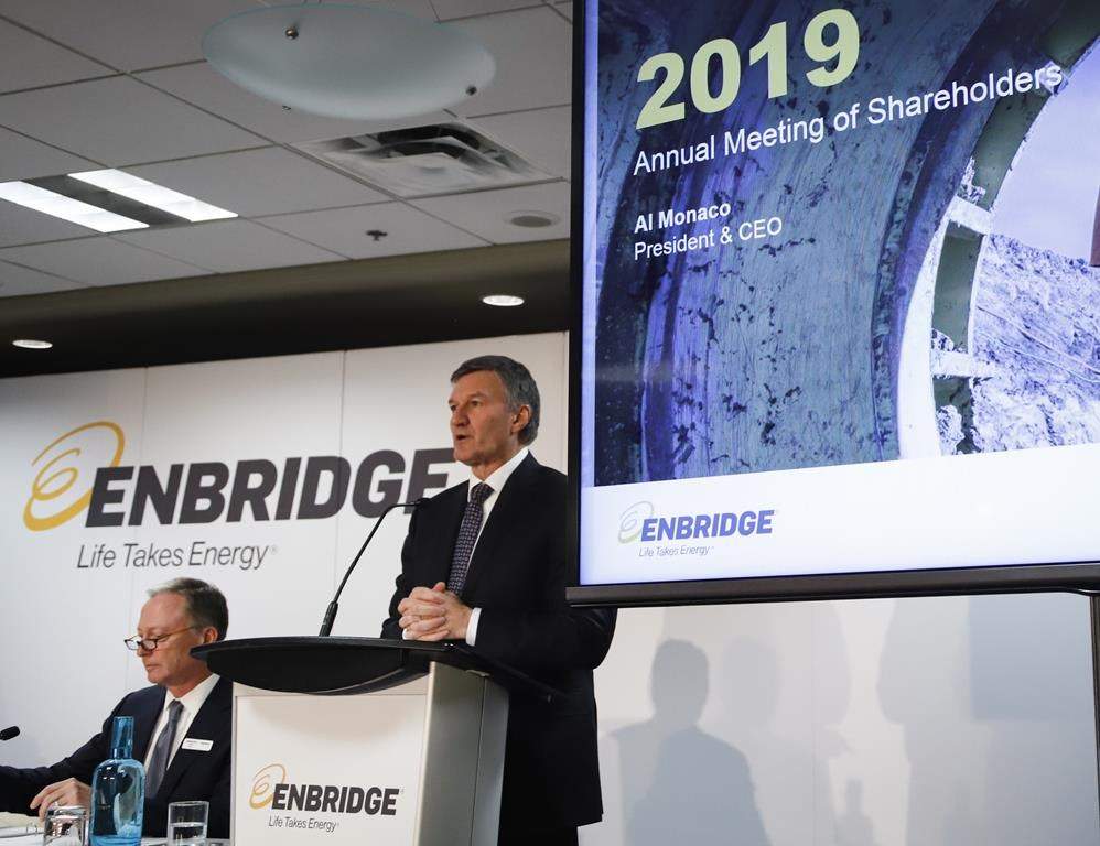 Enbridge president and CEO Al Monaco, right, addresses the company's annual meeting in Calgary, Wednesday, May 8, 2019.