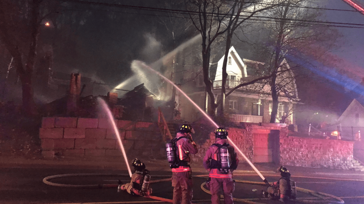 Firefighters battle an early morning blaze right by Hamilton's escarpment on Saturday, May 14, 2022.