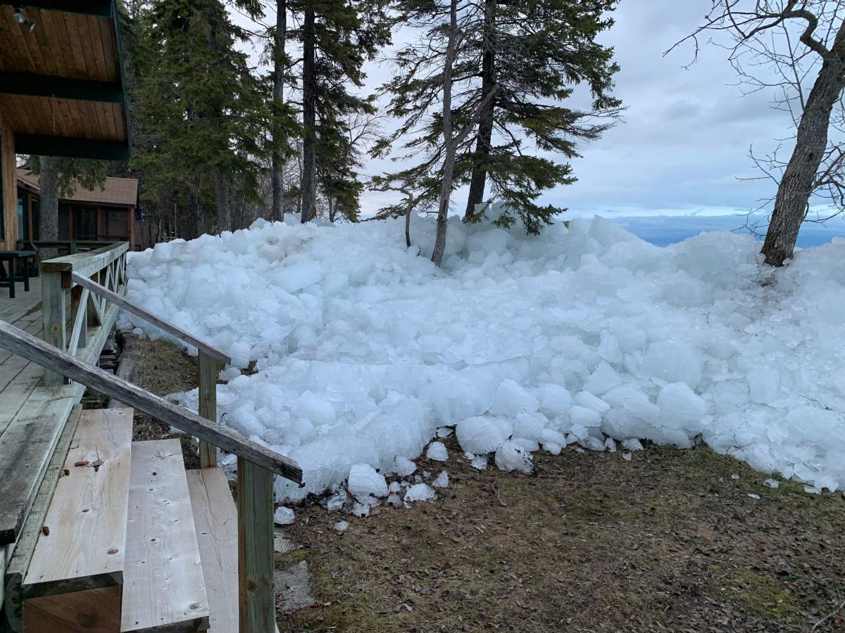 Ice build up pushes against building and knocks down trees at Camp Arnes north of Gimli, Man./Wilma Geschiere