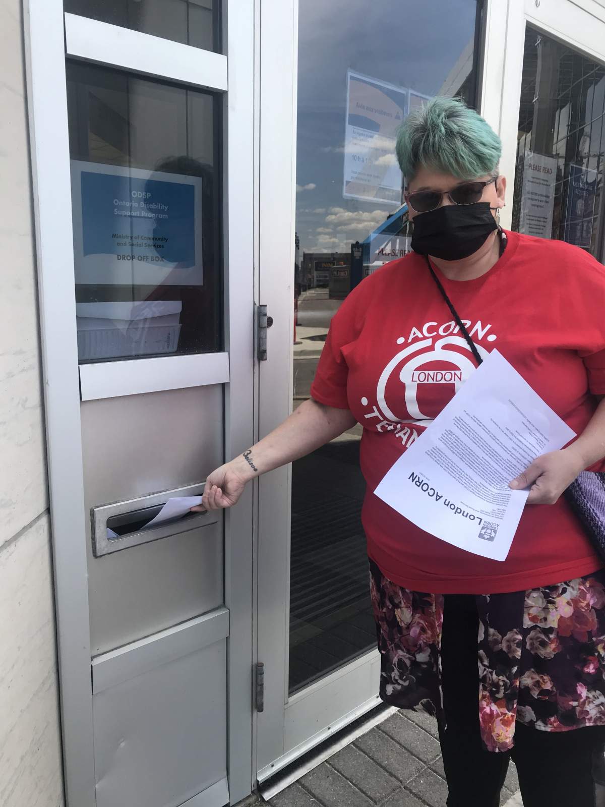 London ACORN leader Betty Morrison delivers a demand letter to an ODSP office during a rally in London, Ont.