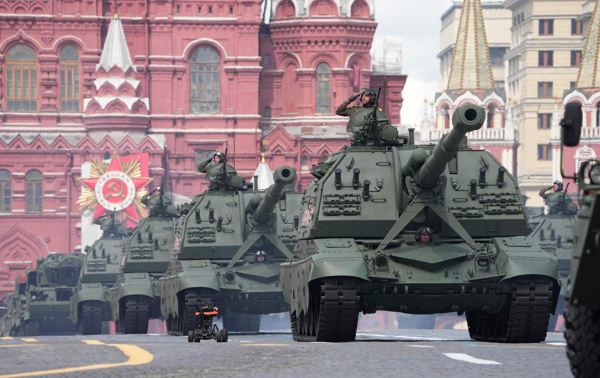 Russian self-propelled artillery vehicles roll during the Victory Day military parade in Moscow, Russia, Monday, May 9, 2022, marking the 77th anniversary of the end of World War II.