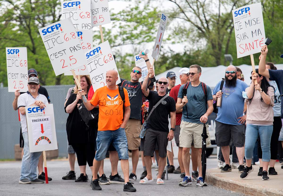 Croupiers protest outside the Casino in Montreal, Saturday, May 21, 2022, where they launched an unlimited general strike. 