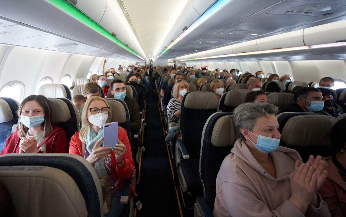 Ukrainian nationals fleeing the ongoing Russian invasion of Ukraine arrive at the Winnipeg airport on Monday, May 23, 2022.