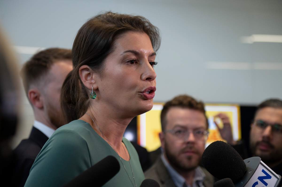 Quebec Deputy premier and Public Security Minister Geneviève Guilbault responds to reporters questions as he arrive for the Coalition Avenir Québec annual congress. in Drummondville, Que., Saturday, May 28, 2022.