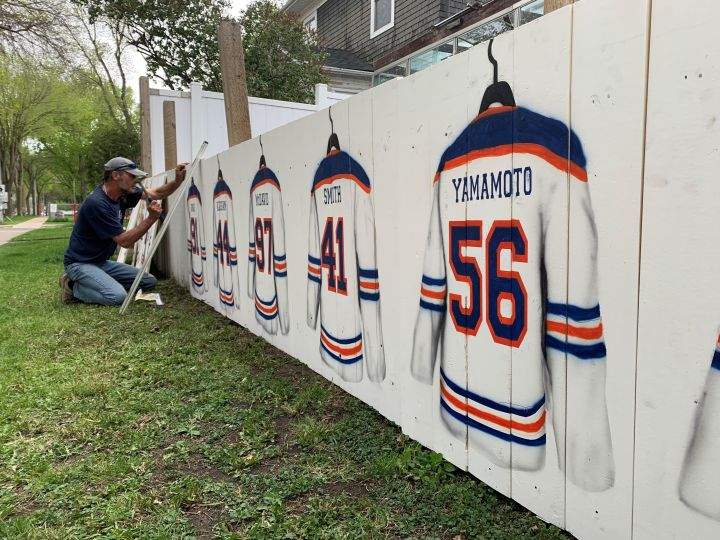 A wooden fence is pleasing hockey fans in Alberta’s capital because it is a tribute to the Edmonton Oilers and meant to cheer the team on in the playoffs.
