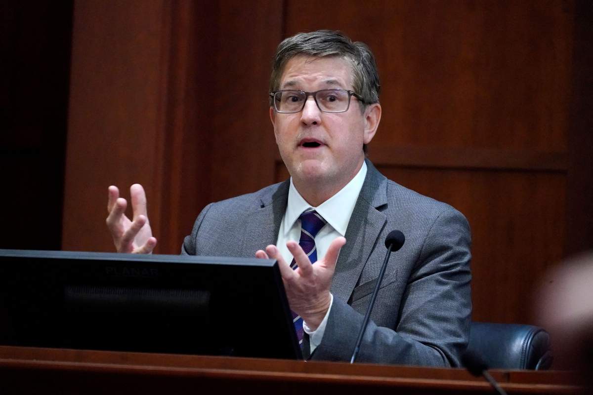 Douglas Bania, licensing and damages expert, testifies in the courtroom at the Fairfax County Circuit Court in Fairfax, Virginia, on May 2, 2022.