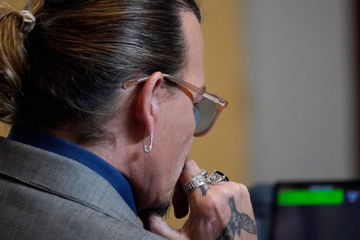 Johnny Depp listens in the courtroom at the Fairfax County Circuit Courthouse in Fairfax, Virginia, on May 16, 2022.