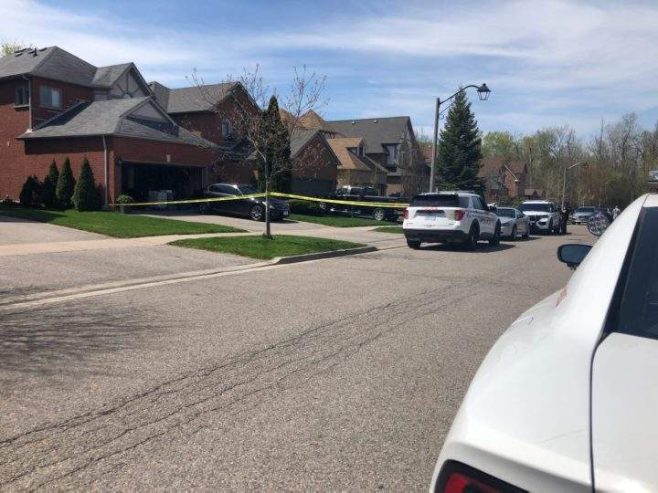 Police at the scene of a stabbing at a home in Pickering on Wednesday.