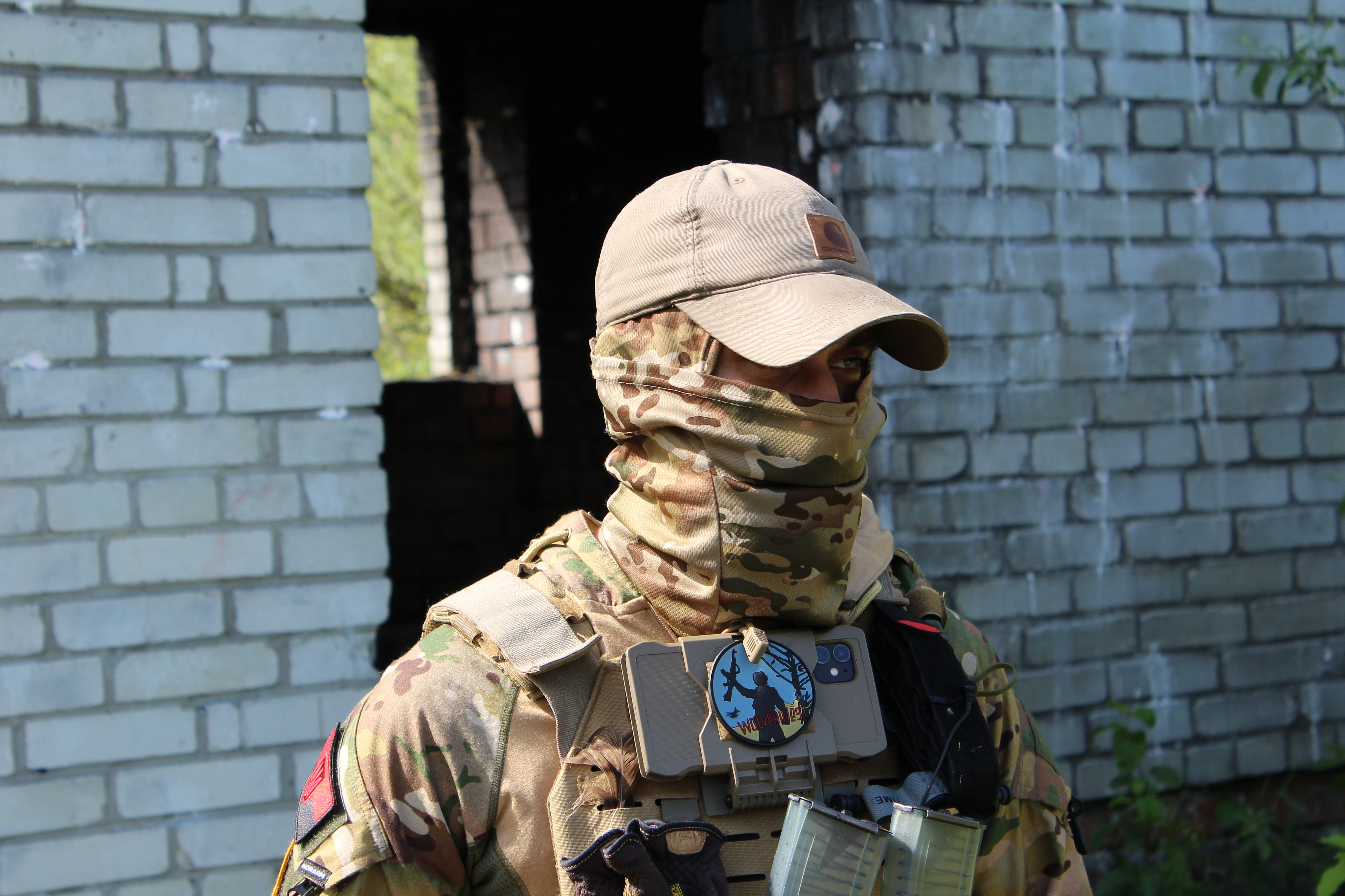 An American founder of the Wolverines wears the group’s patch on his chest at a training camp in west Ukraine.