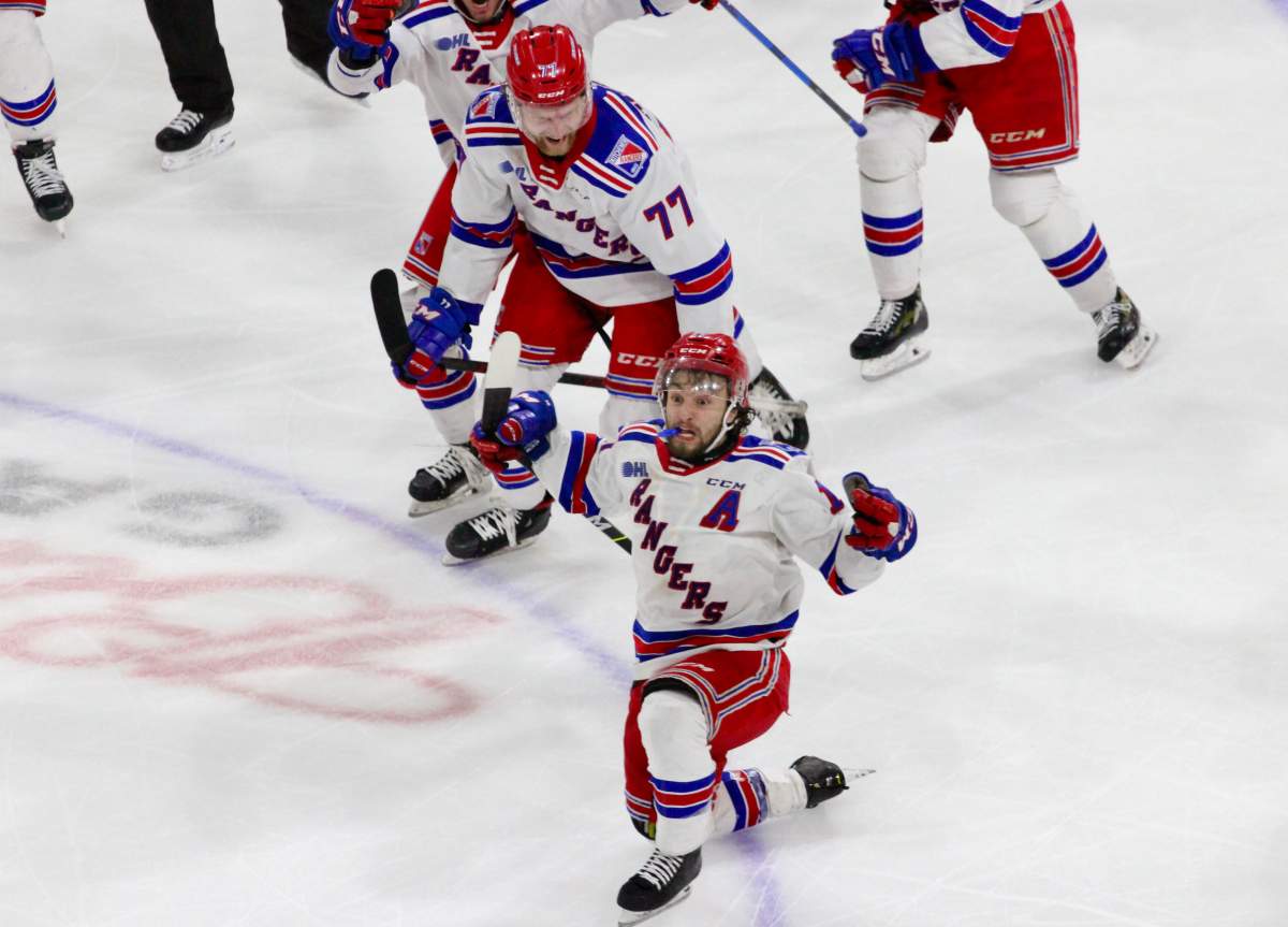 Mike Petizian of the Kitchener Rangers celebrates his series winning overtime goal.