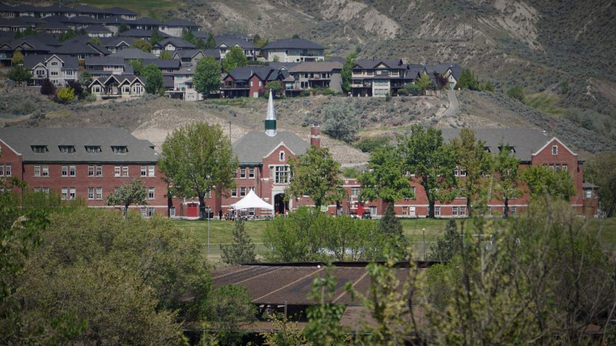 The former Kamloops Indian Residential School is seen from across the South Thompson River in Kamloops, B.C. on Sun. May 22, 2022.