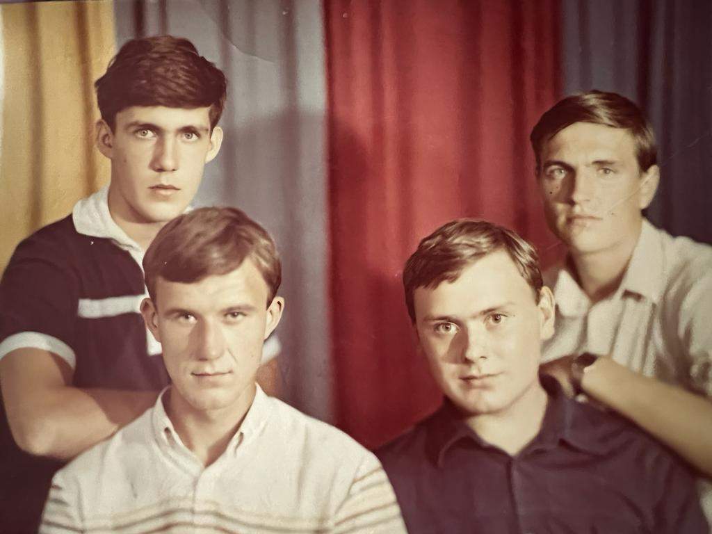 Valery Kot, top left, in a photo found in the house where he was killed in Mala Rohan, Ukraine. May 23, 2022.