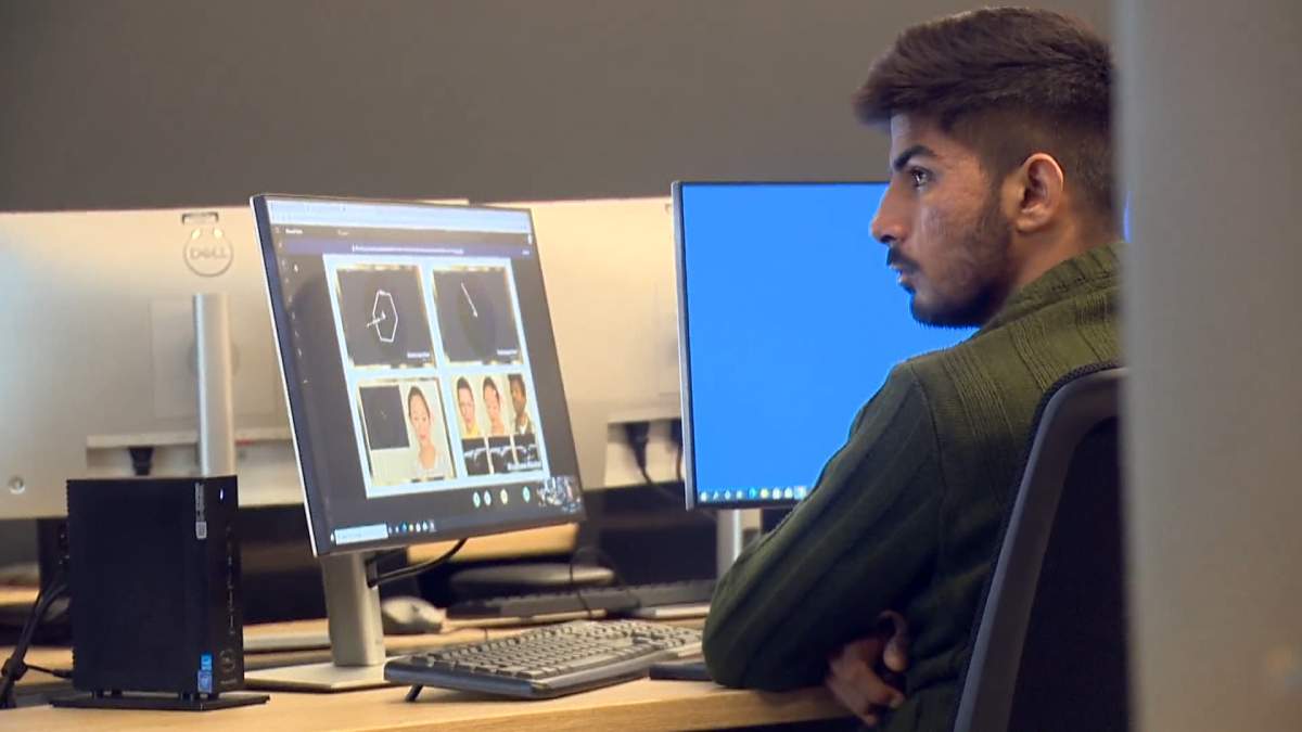 A student at Bow Valley College's centre of entertainment arts receives instruction on May 17, 2022.