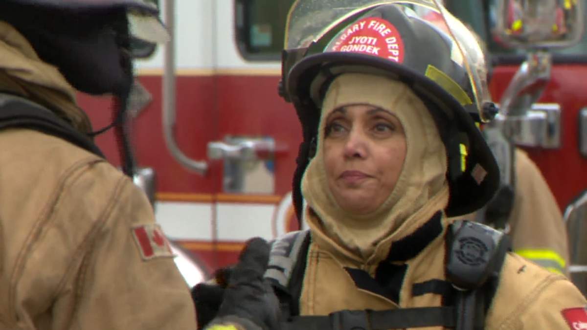 Calgary Mayor Jyoti Gondek is seen in full firefighter on May 30, 2022, as part of a firefighter training experience for city council.