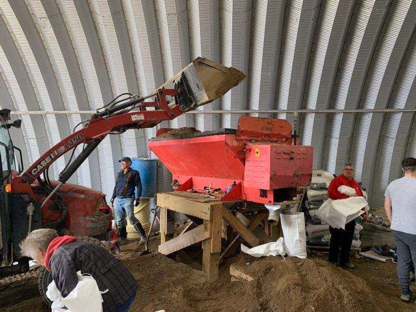 Sandbags are made in Minnedosa Tuesday.