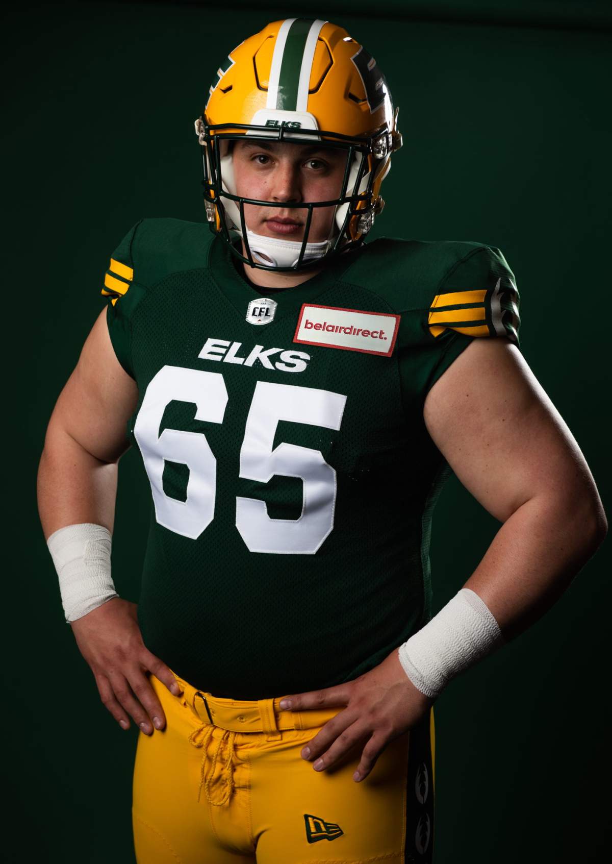 Edmonton Elks players in the team's new jerseys