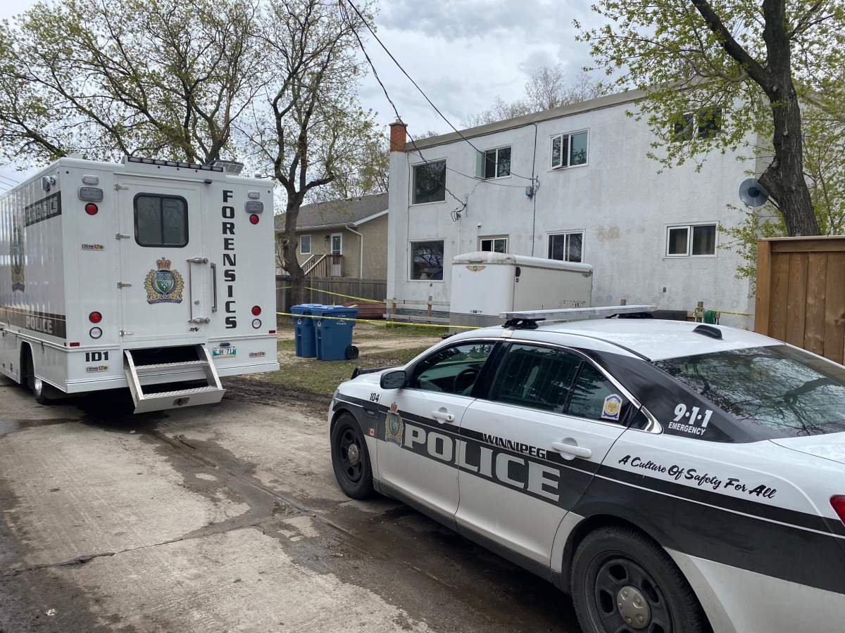 Winnipeg police forensics investigators at the Edison Avenue scene Thursday.