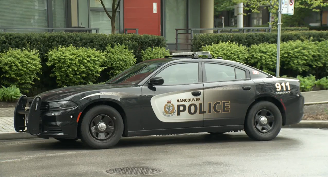 A Vancouver police car is seen parked outside a Mount Pleasant apartment building on Mon. May 2, 2022. Police are investigating a suspected impaired driving crash in downtown Vancouver on Fri. Nov. 25, 2022.