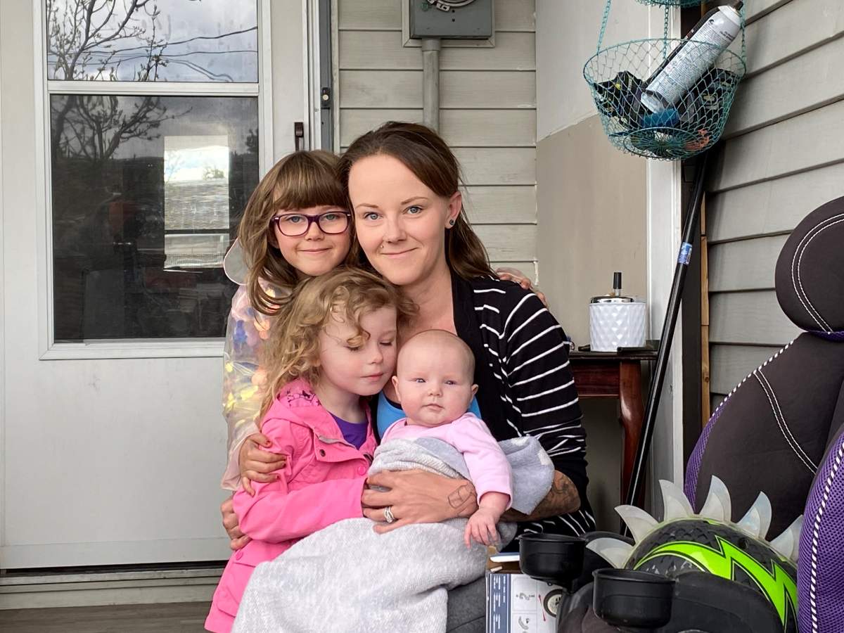 Ashley Yaromy and kids outside current rental