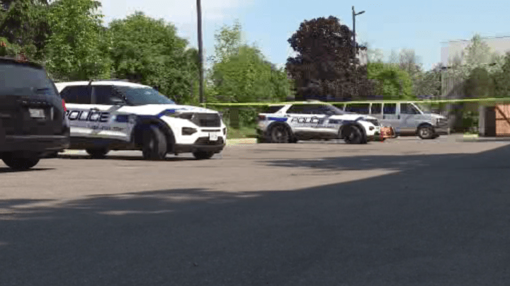 Police in a Motel 6 parking lot in the area of Tomken and Steelwell roads in Brampton on Monday.