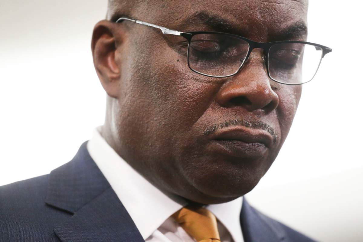 Buffalo Mayor Byron Brown takes a moment of silence and prayer following a shooting at a supermarket on Saturday, May 14, 2022, in Buffalo, N.Y.