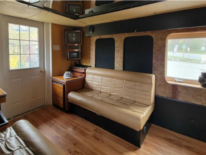 The caboose, which does not have a bathroom, kitchen or running water, was previously used by a limousine company.