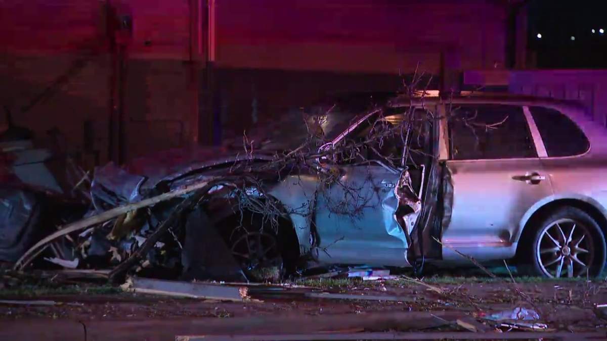 Police investigate after a car crashed into the side of a home along Silver Berry Road between 29 Street and 28A Avenue in southeast Edmonton Thursday, May 26, 2022.