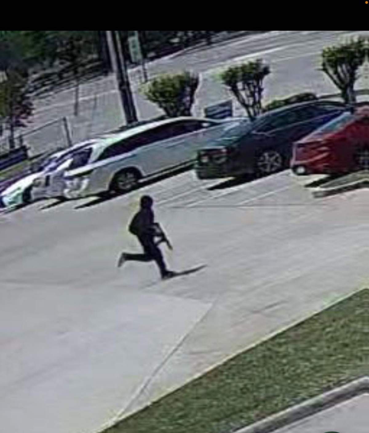 Police released stills from surveillance cameras that caught an image of the suspect who opened fire in a Korean hair salon in Dallas.